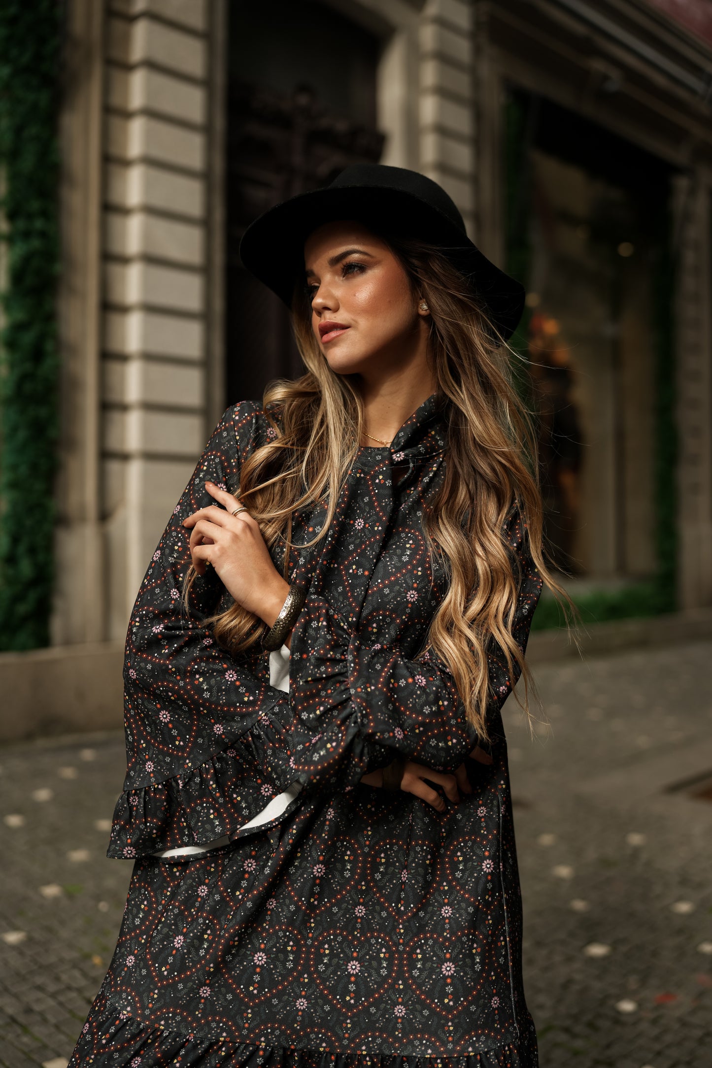 Dress with bow at the neckline