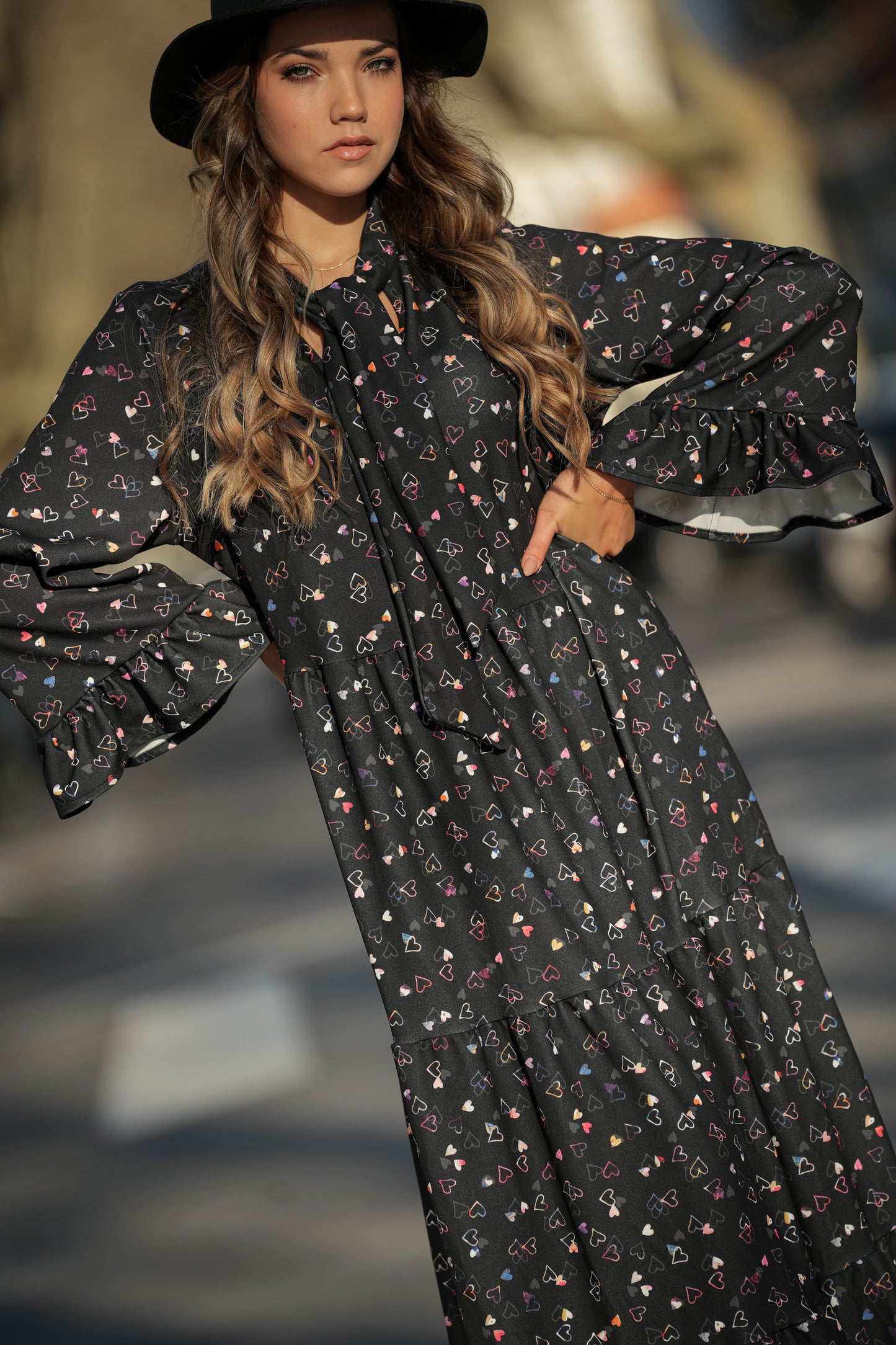 Dress with bow at the neckline