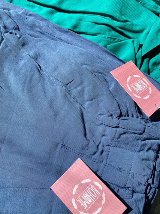 <transcy>Pantalones con cinturón</transcy>