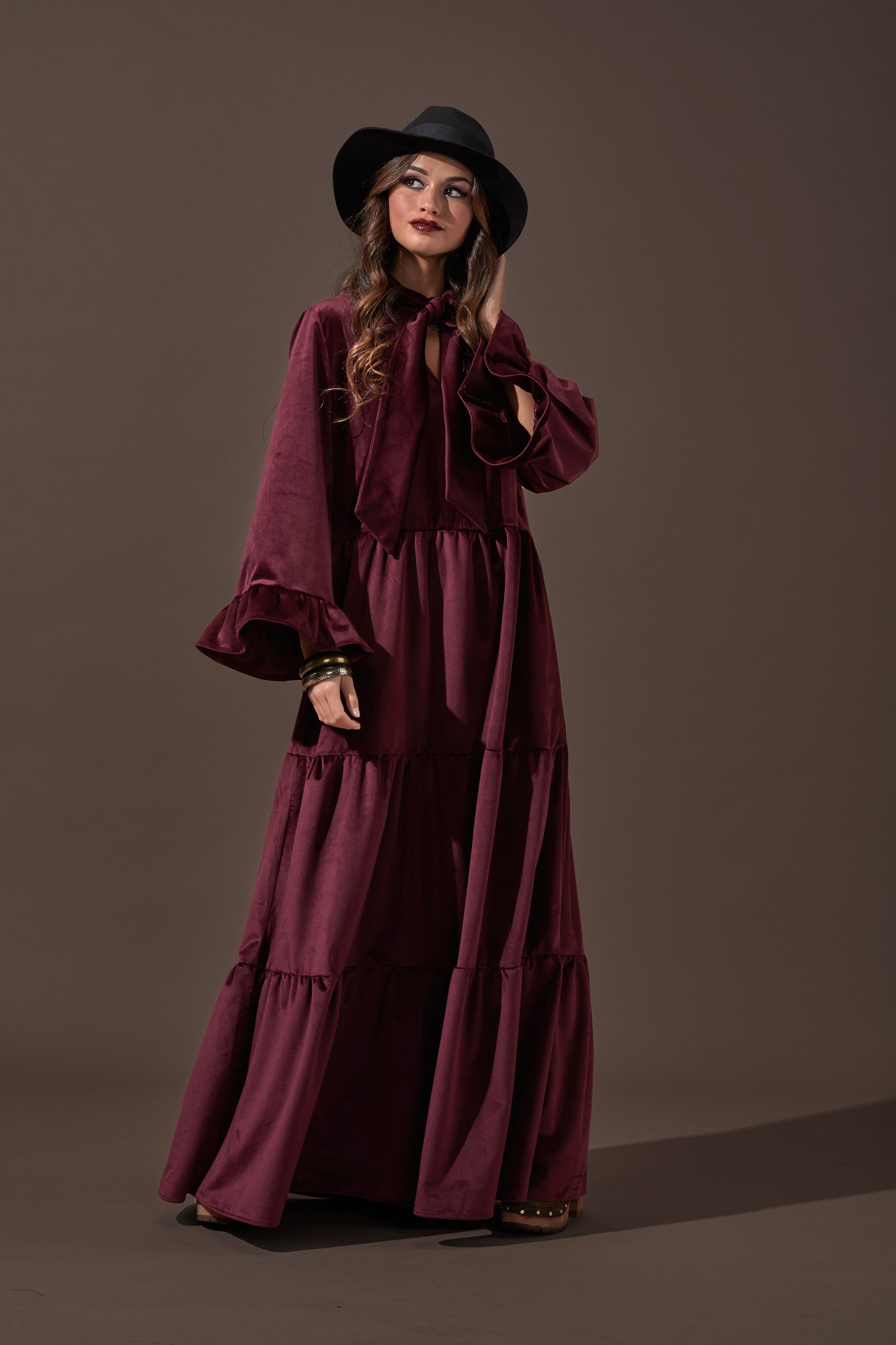 Long dress with bow at the neckline