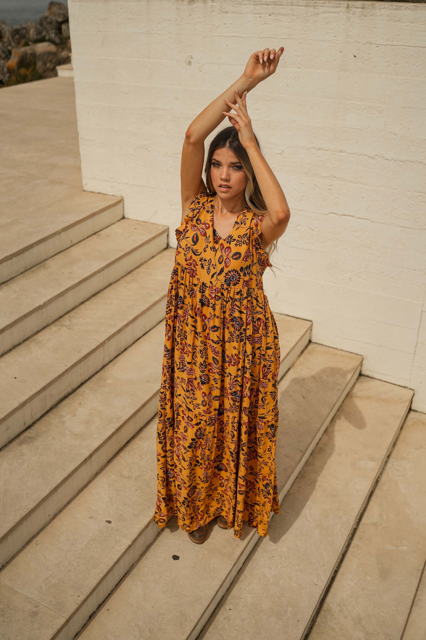 Long dress with floral print ruffles