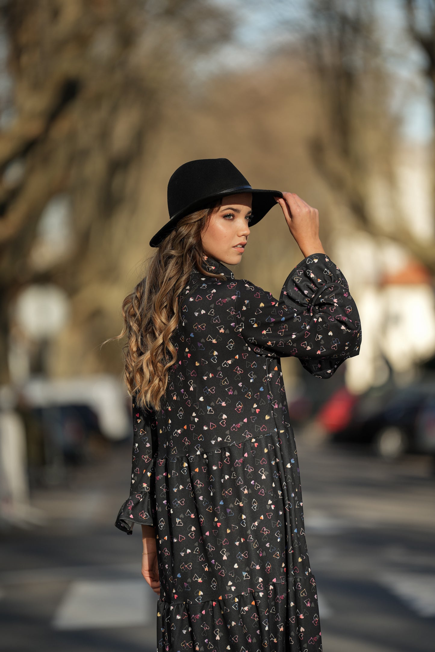 Dress with bow at the neckline